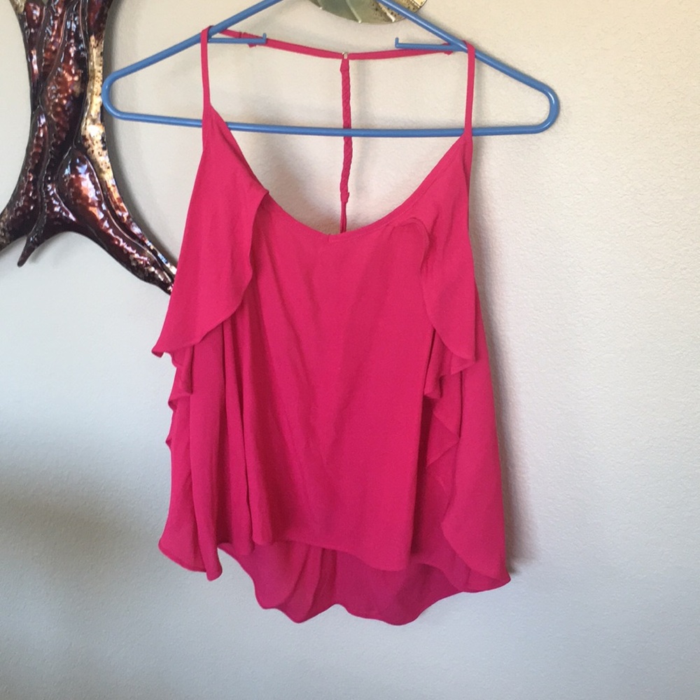 Beautiful flowy top. Open back.